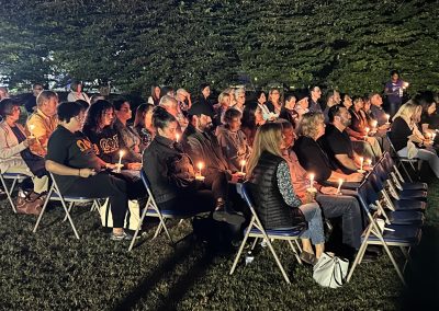 Attendees holding candles at 2023 Vigil